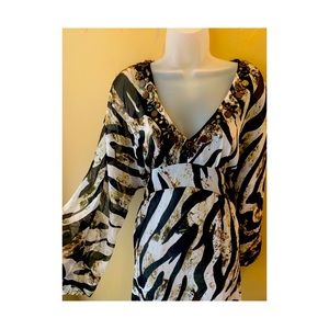 Pretty and fun dress!  Size Large.